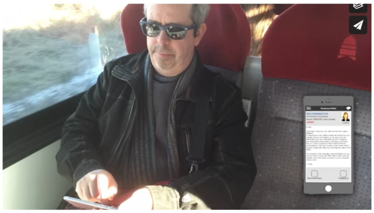 Dave Malouf reviewing the Managed Cloud story on a mobile prototype while traveling